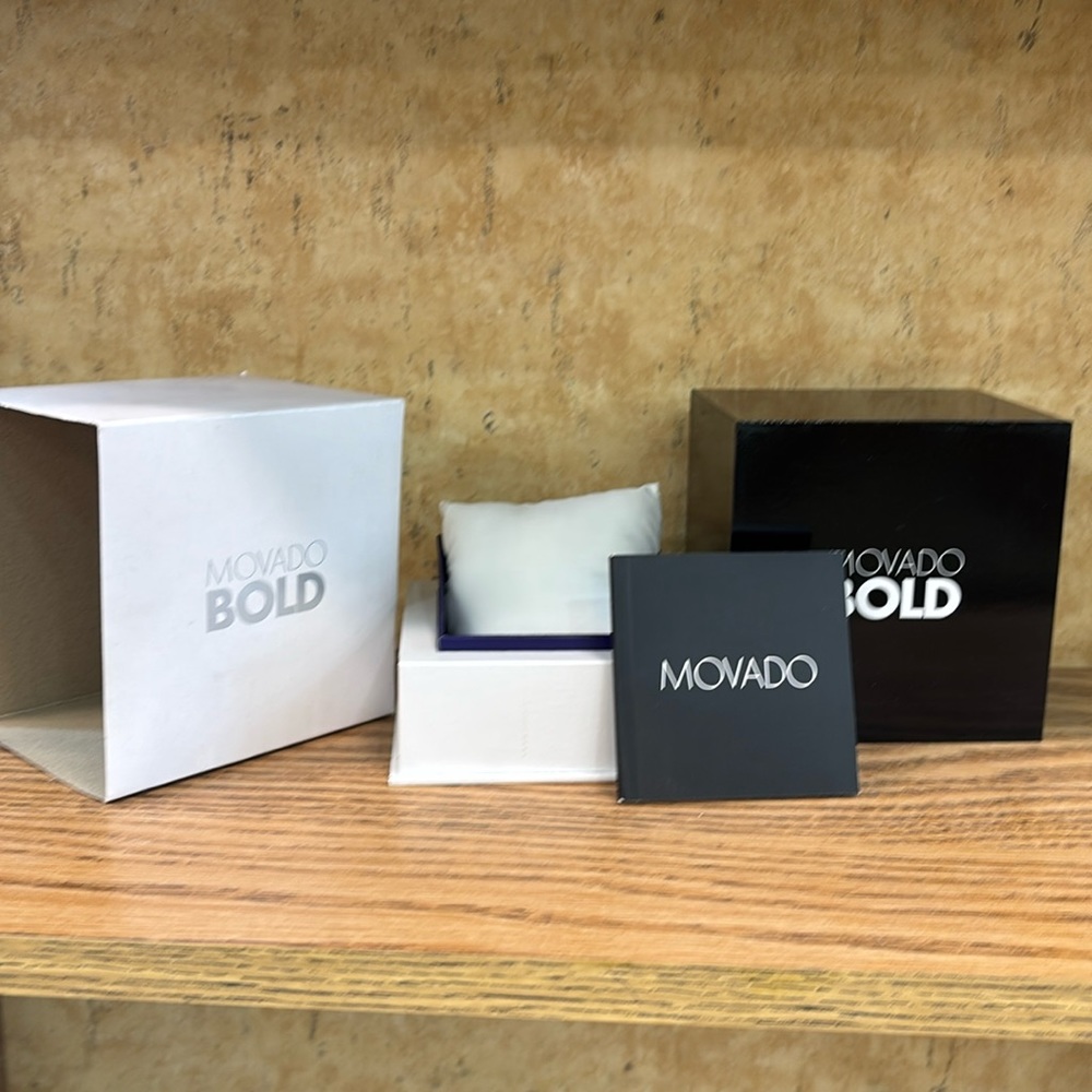 COPY - Movado Bold watch box with outer sleeve and booklet.